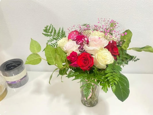 Dozen Pink & White Roses in a glass vase